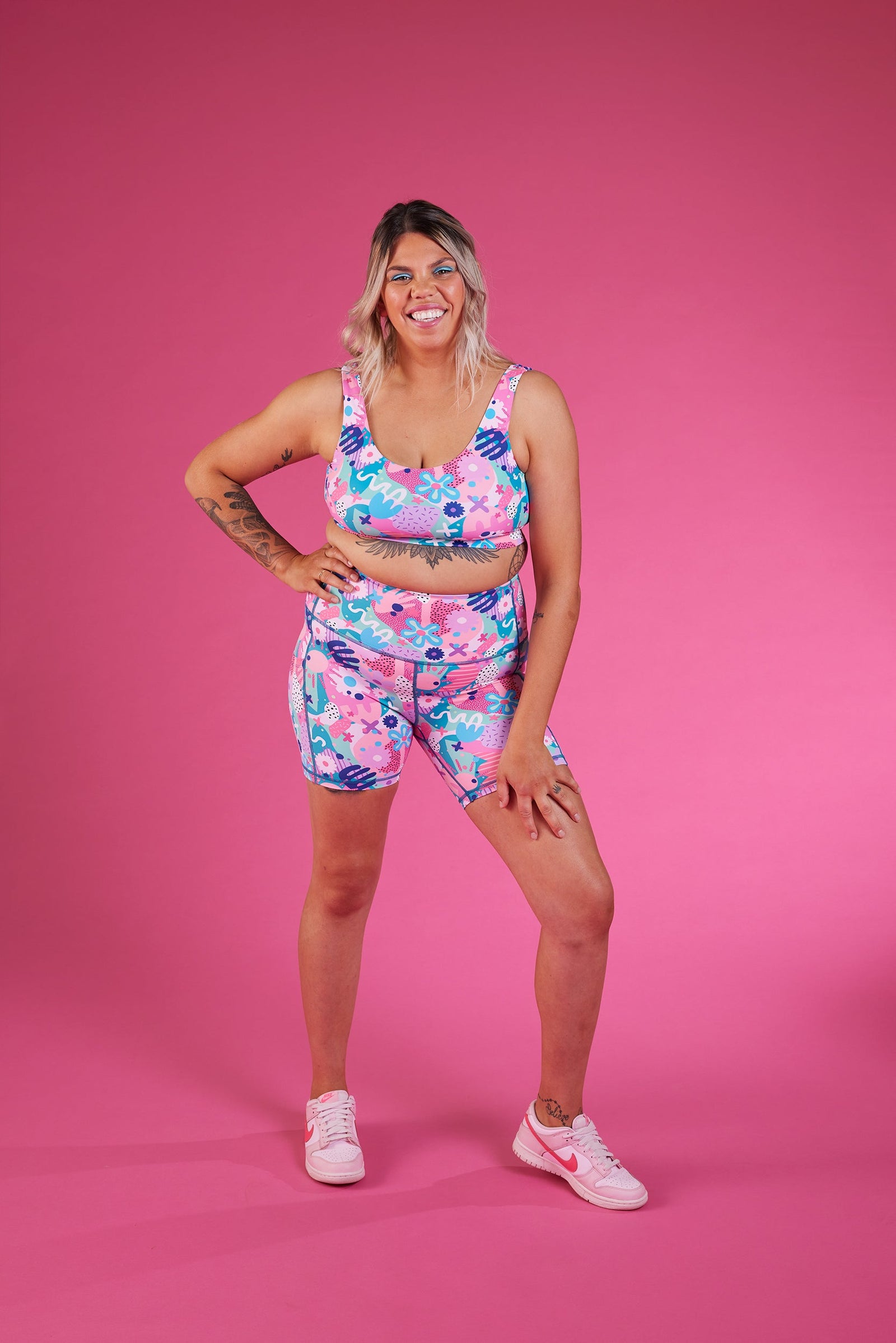 Tarsh Bamblett wears Mama Movement shortie shorts in the print Razzle Dazzle