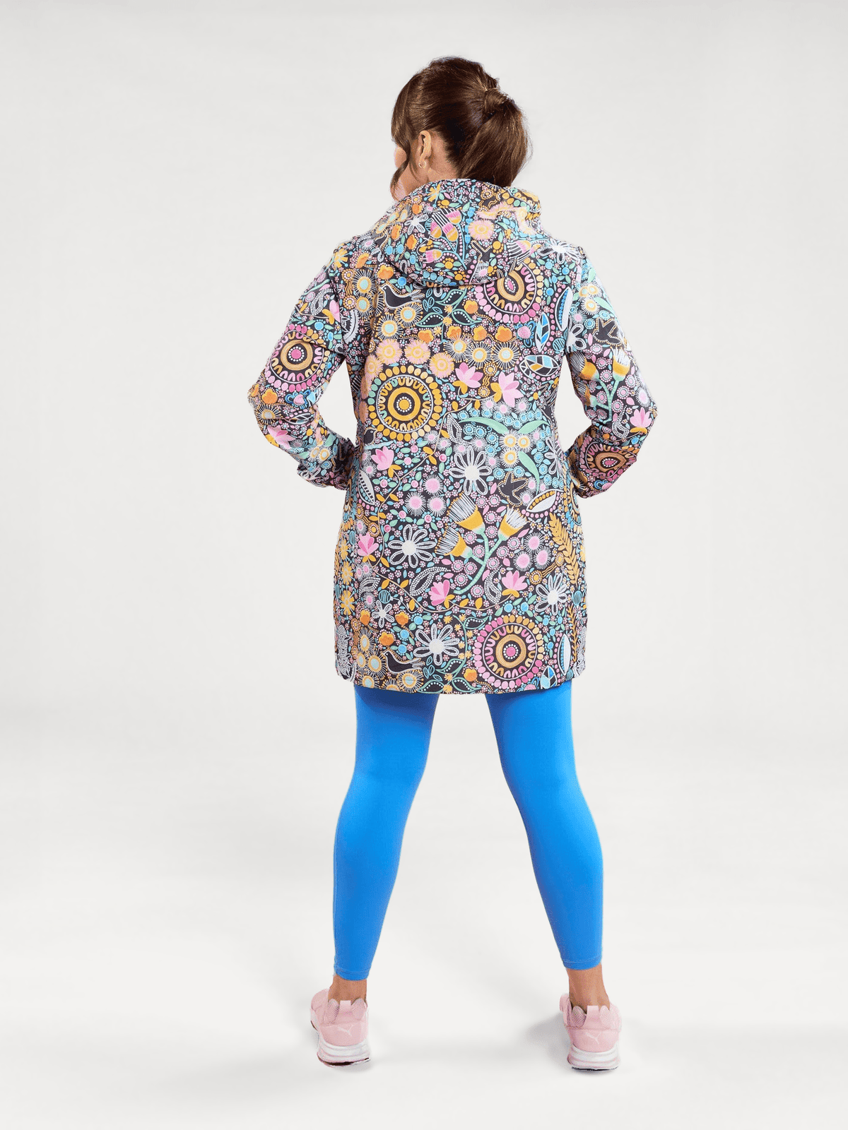 Coastal Wildflowers Longline Raincoat - longline raincoat with adjustable hood, worn by Kirra