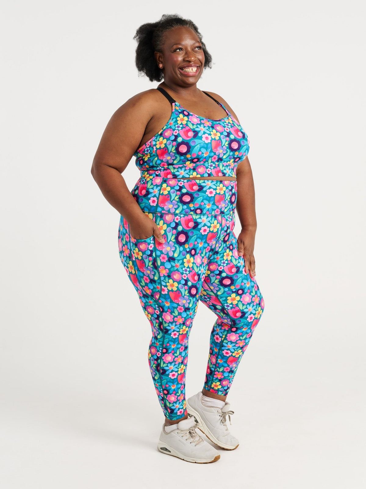 Zee wearing the Floral Fields Everyday 7/8 Legging and Floral Fields Miracle Nursing Sports Bra, colourful floral activewear