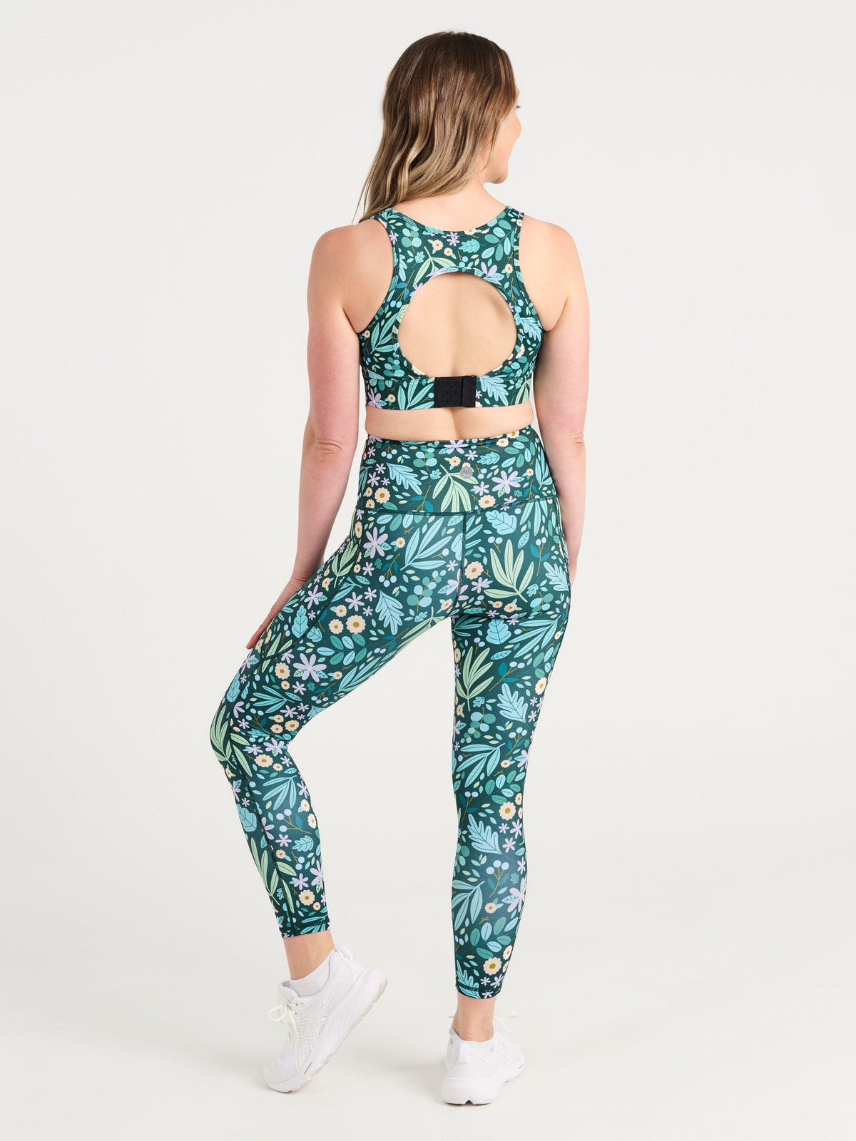 Jennifer wearing the Leaves & Blooms Everyday 7/8 Legging and Leaves & Blooms Liberty Hookback Crop, green botanical print activewear
