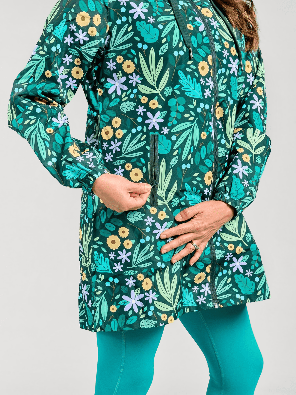 Leaves & Blooms Longline Raincoat - fully waterproof secured zips floral jacket, worn by Olga