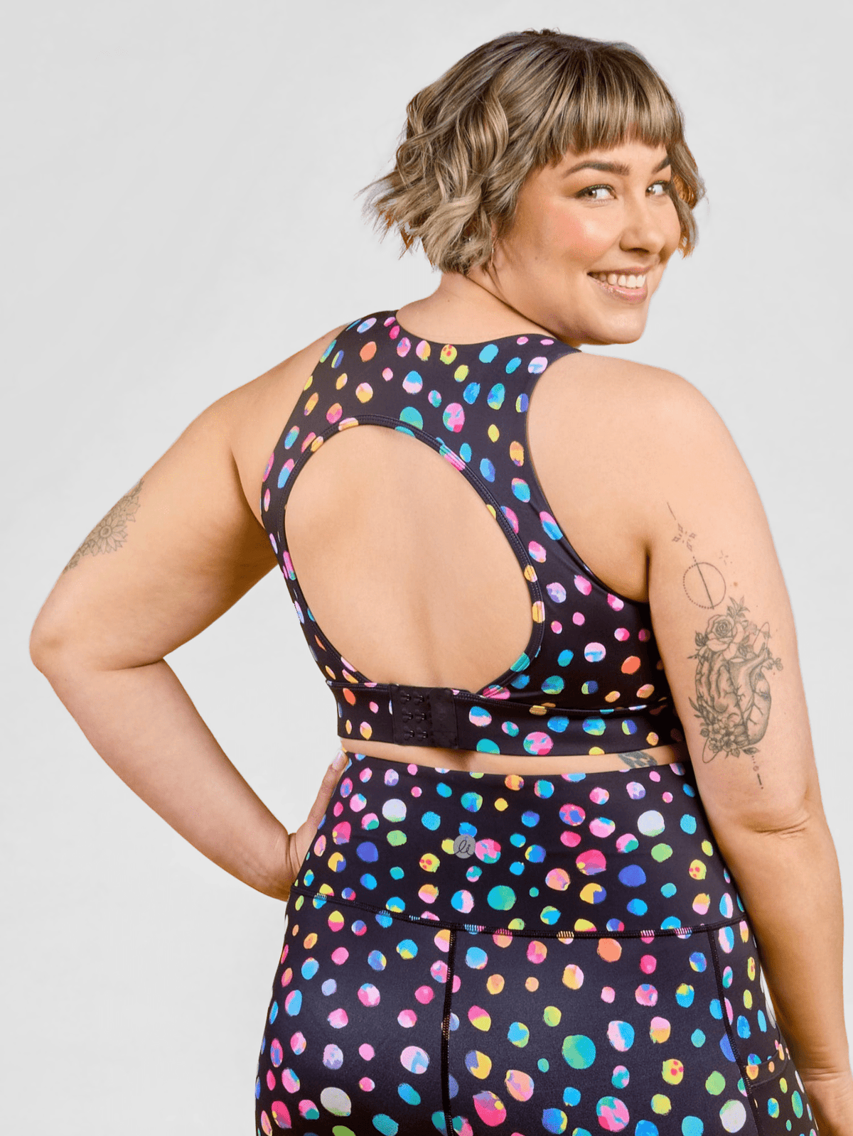 Night Polka Liberty Hookback Nursing Crop - nursing sports bra with extender, worn by Steph