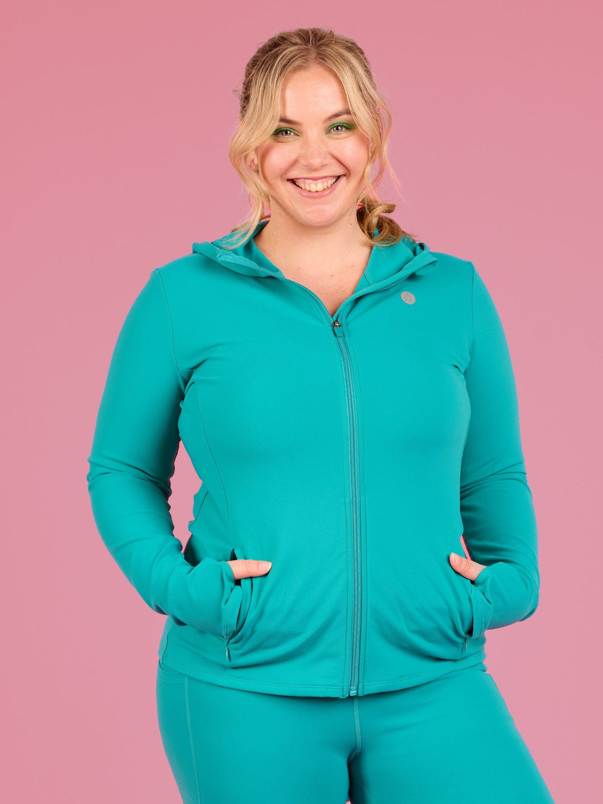 Teal Elevate Running Jacket - zippered front pockets deep internal pockets