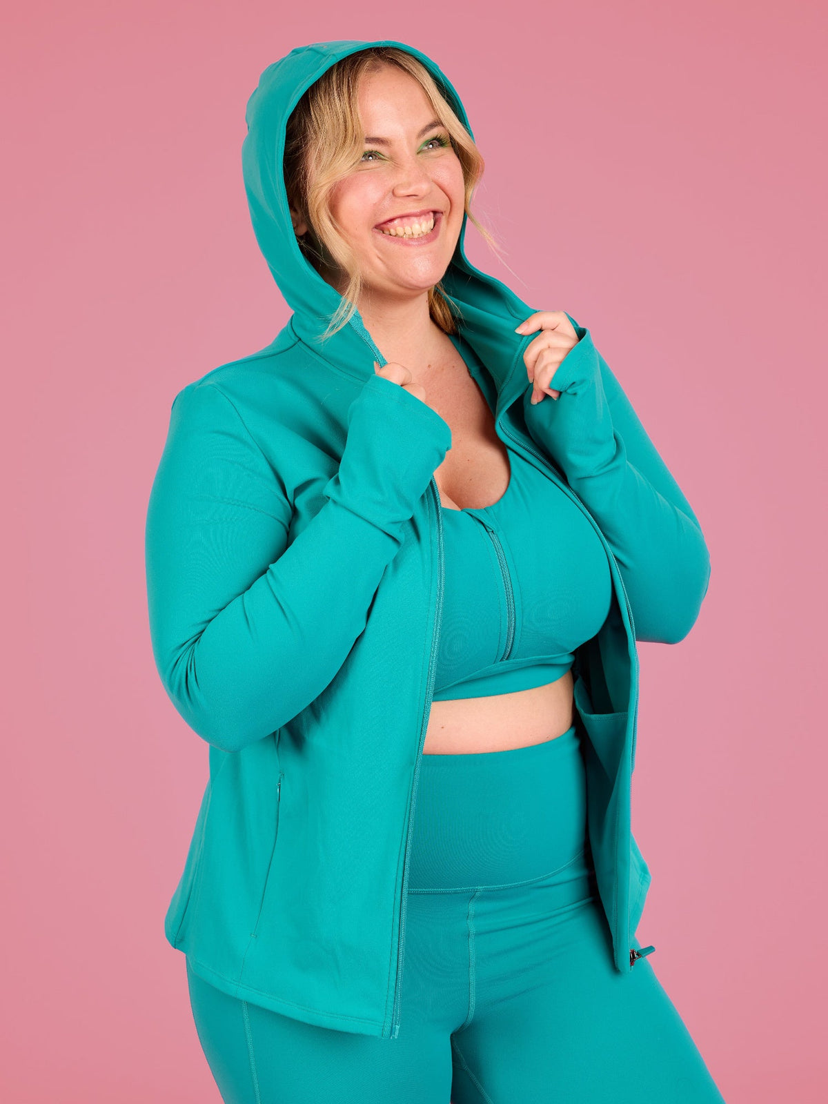 Teal Elevate Running Jacket - thumbholes and built in hood extra warmth