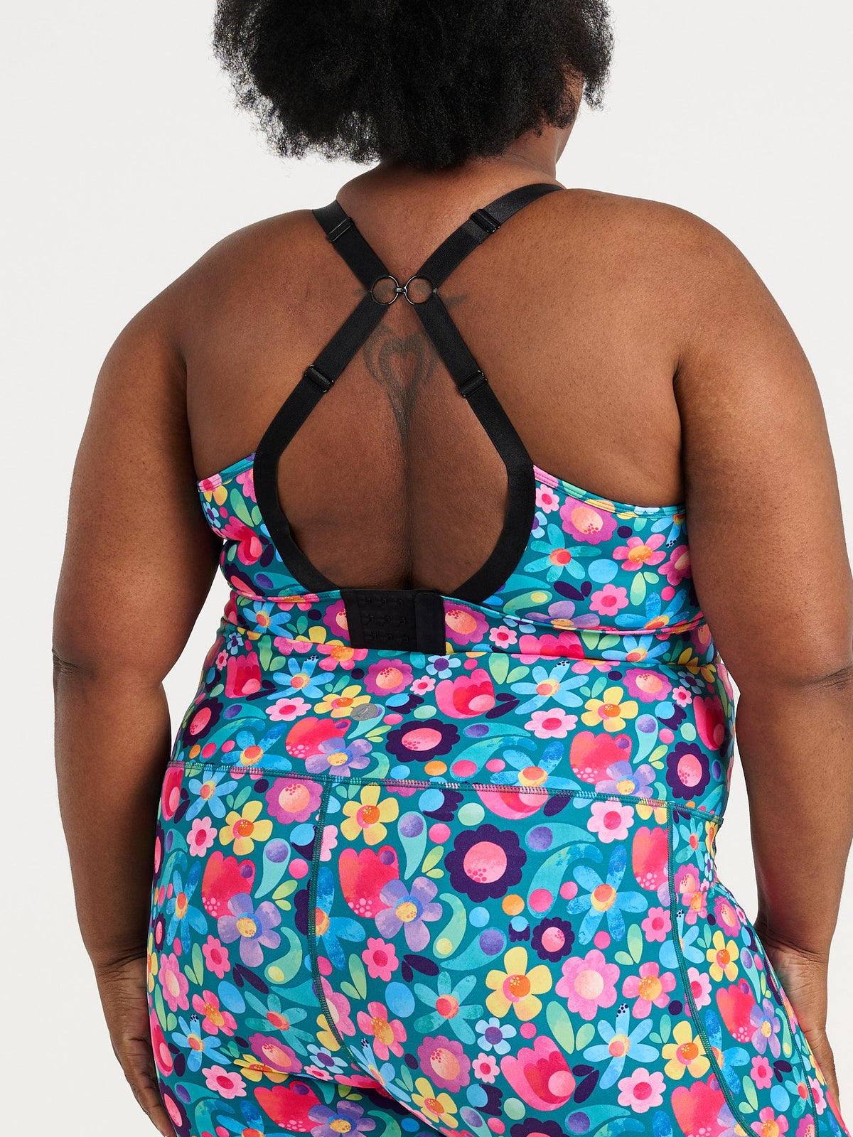 Zee wearing the Floral Fields Everyday 7/8 Legging and Floral Fields Miracle Nursing Sports Bra, colourful floral activewear