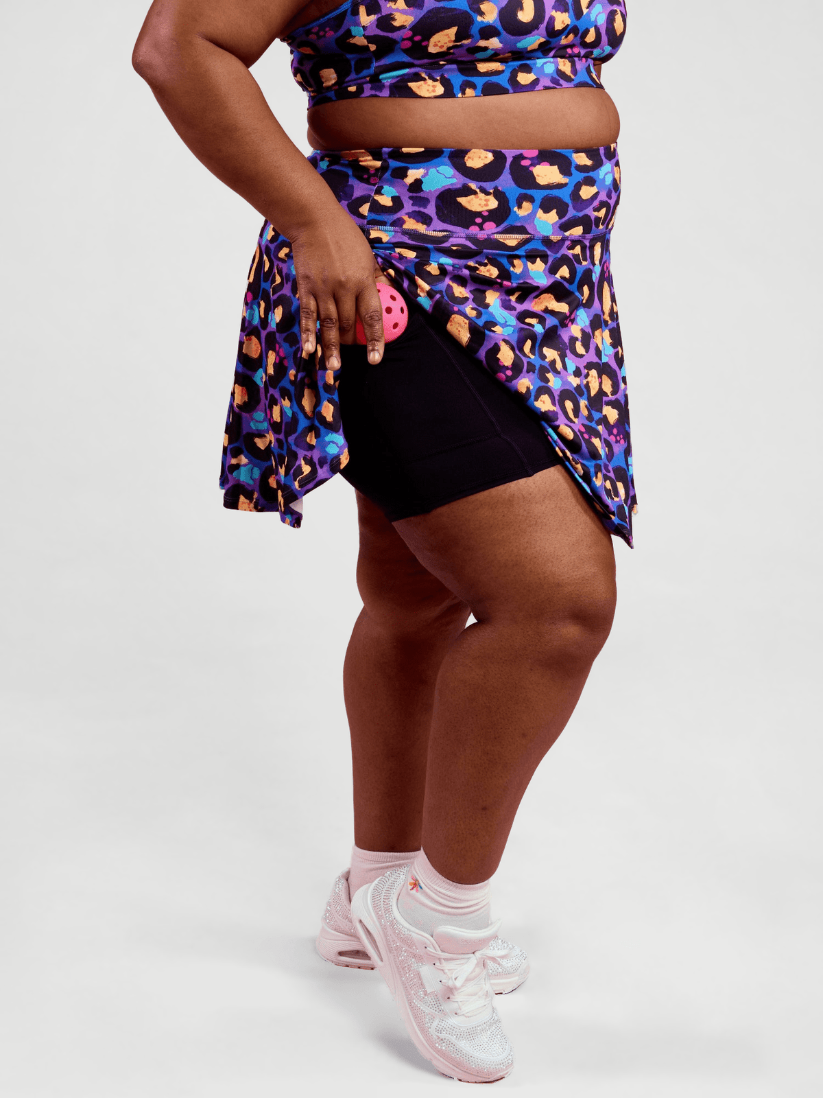 Berry Leopard Skort - sustainable recycled material, worn by Zee