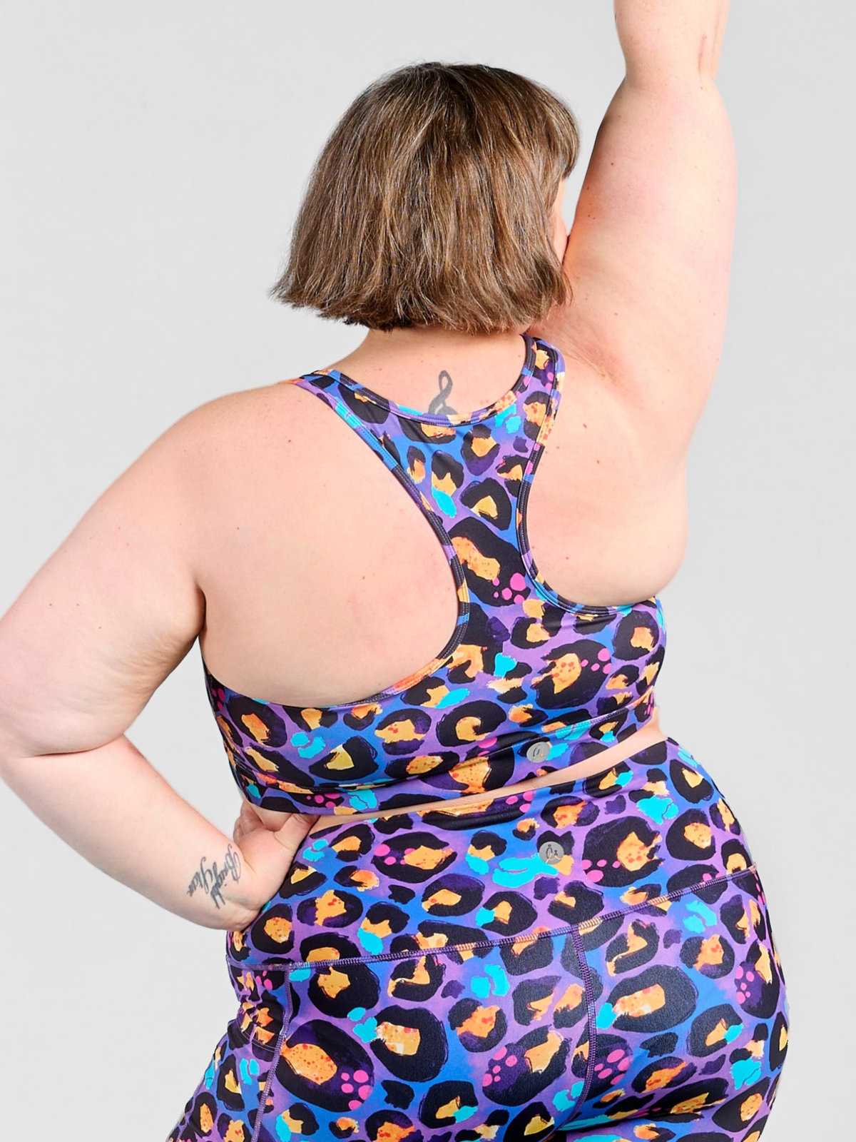 Berry Leopard Ultimate Racerback Crop - Supportive racerback crop, worn by Kathleen
