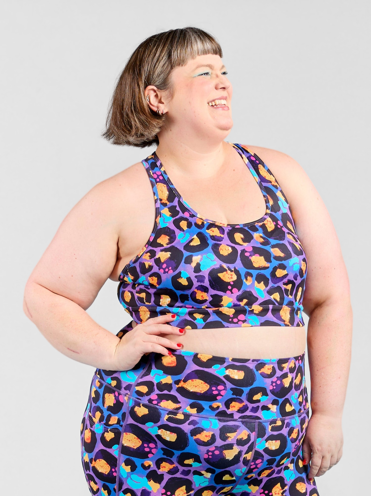 Berry Leopard Ultimate Racerback Crop - Sports bra easy to put on, worn by Kathleen
