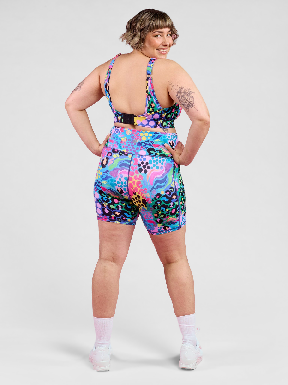 Electric Leopard FlexiZip Crop II - Zip sports bra with adjustable straps Kasey Rainbow, worn by Steph