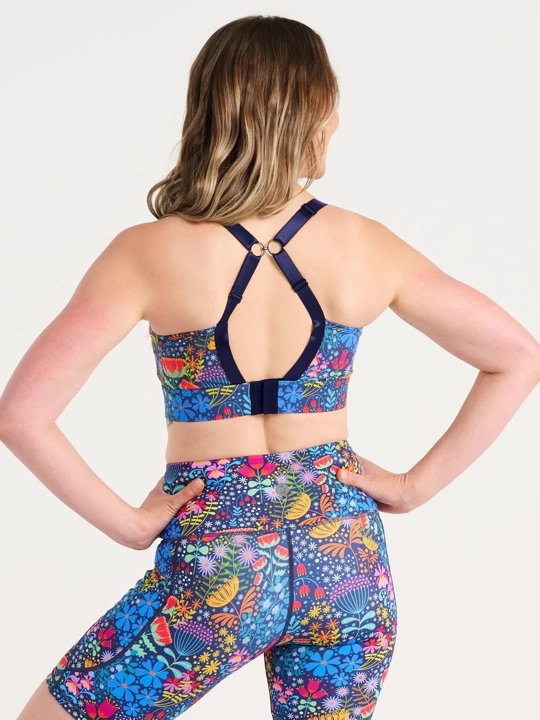 Ellie's Garden Miracle Nursing Sports Bra - racerback view with dark navy straps and extender