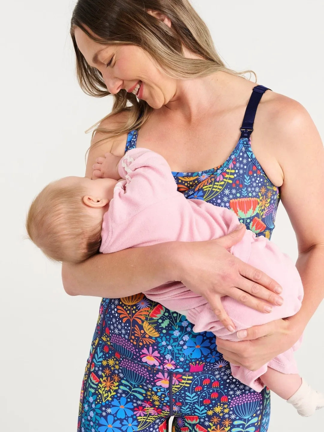 Ellie's Garden Miracle Nursing Sports Bra - nursing view with baby and dark navy straps
