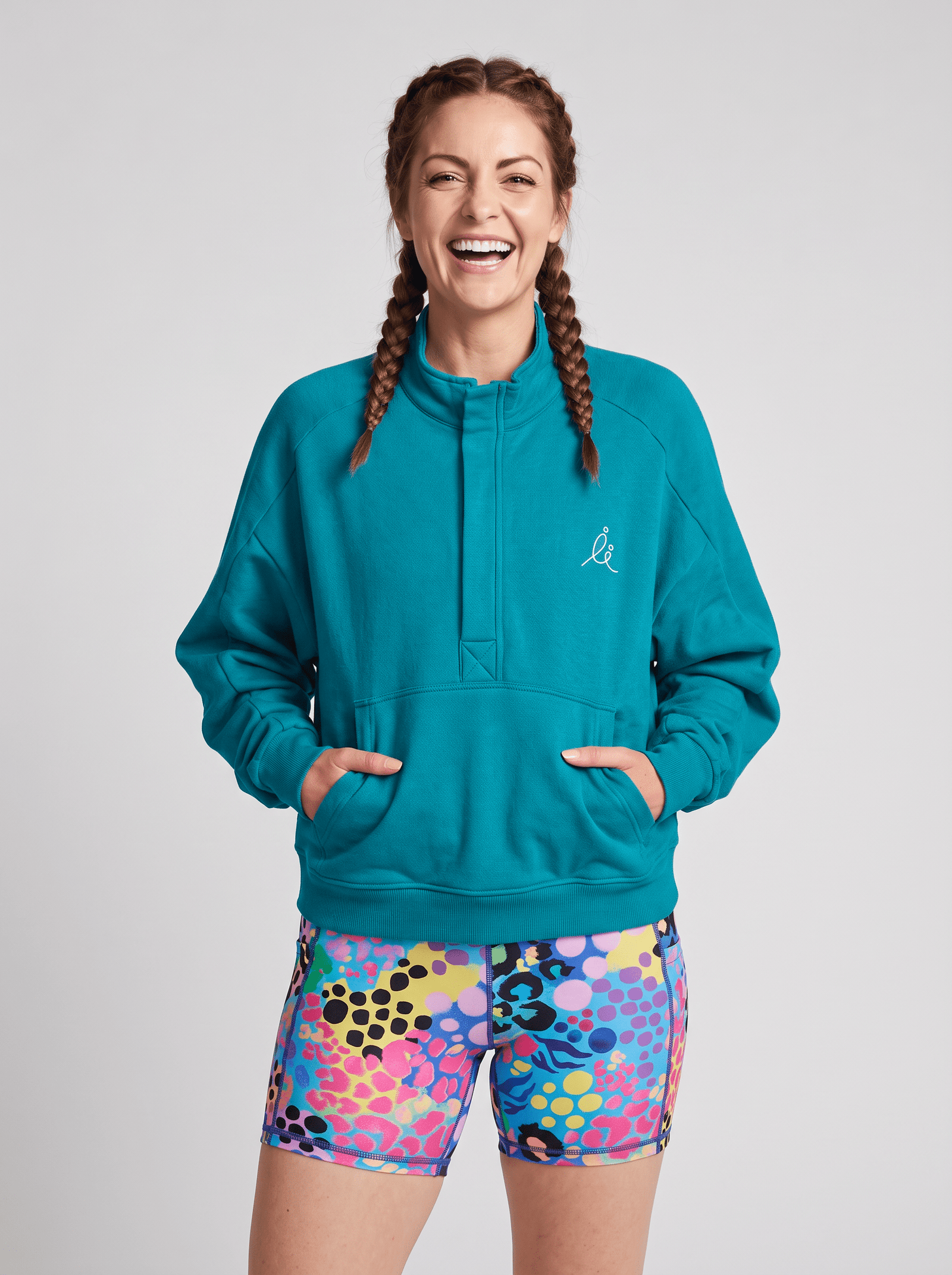 FlexiZip Sweatshirt - Teal - half zip sweatshirt front view with Electric Leopard Everyday Shortie Bike Shorts