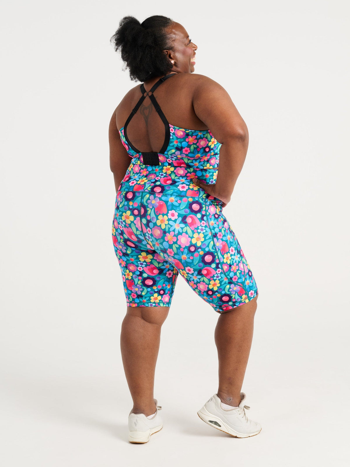 Zee wearing the Floral Fields Everyday Bike Shorts and Floral Fields Miracle Nursing Sports Bra, colourful floral activewear