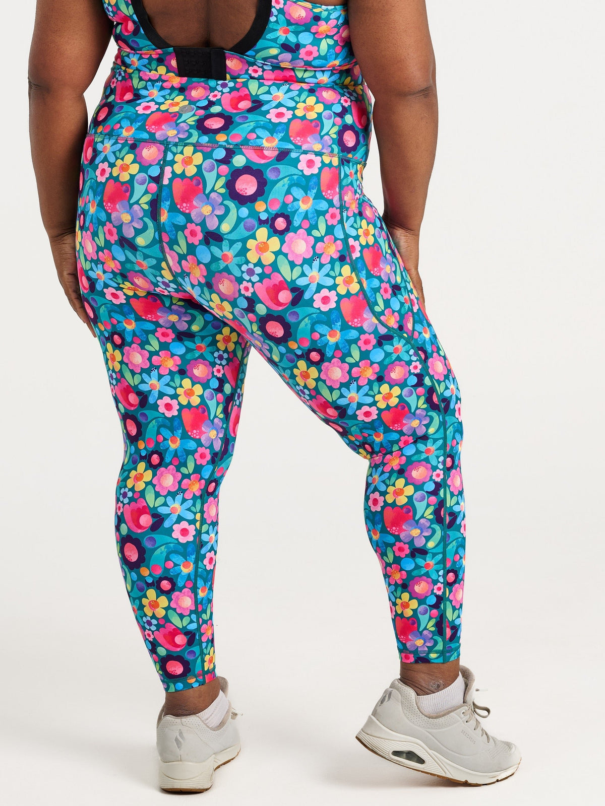 Zee wearing the Floral Fields Everyday 7/8 Legging and Floral Fields Miracle Nursing Sports Bra, colourful floral activewear