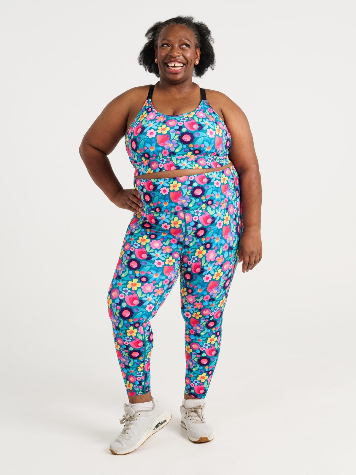 Zee wearing the Floral Fields Everyday 7/8 Legging and Floral Fields Miracle Nursing Sports Bra, colourful floral activewear
