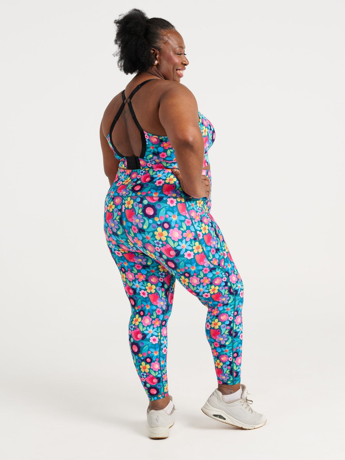 Zee wearing the Floral Fields Everyday 7/8 Legging and Floral Fields Miracle Nursing Sports Bra, colourful floral activewear