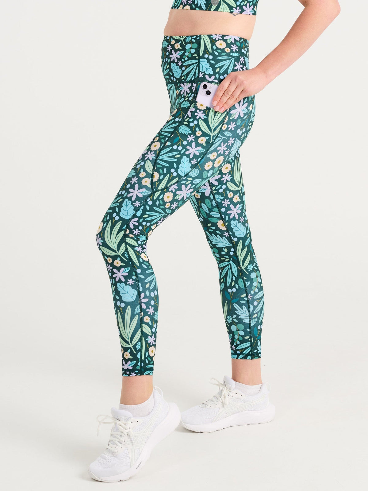 Jennifer wearing the Leaves & Blooms Everyday 7/8 Legging and Leaves & Blooms Liberty Hookback Crop, green botanical print activewear