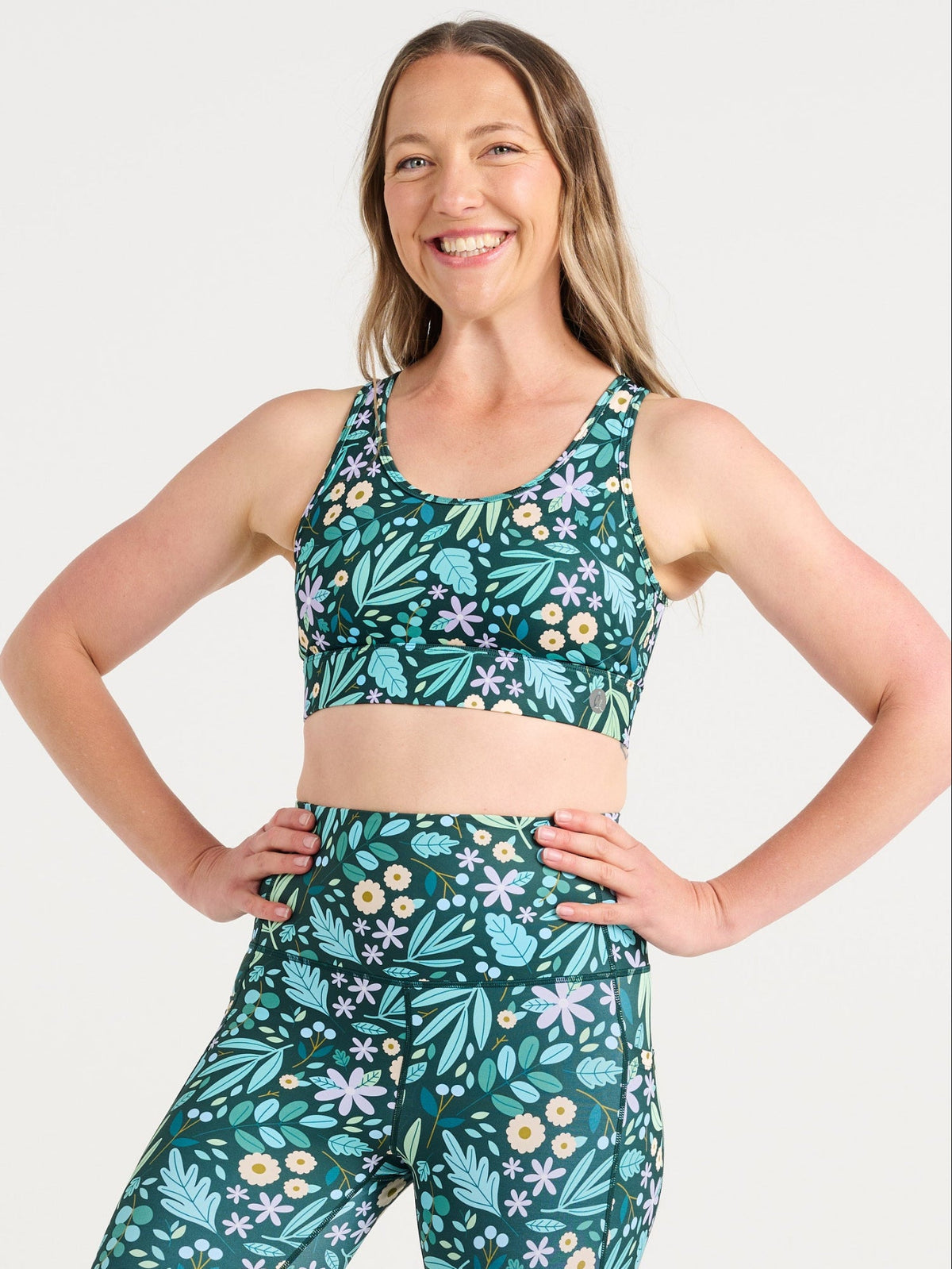 Jennifer wearing the Leaves & Blooms Everyday 7/8 Legging and Leaves & Blooms Liberty Hookback Crop, green botanical print activewear