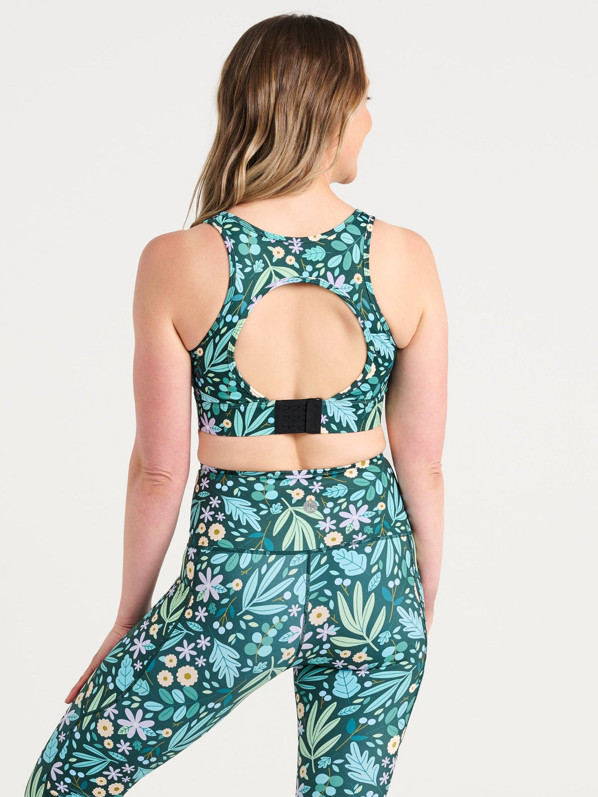 Jennifer wearing the Leaves & Blooms Everyday 7/8 Legging and Leaves & Blooms Liberty Hookback Crop, green botanical print activewear
