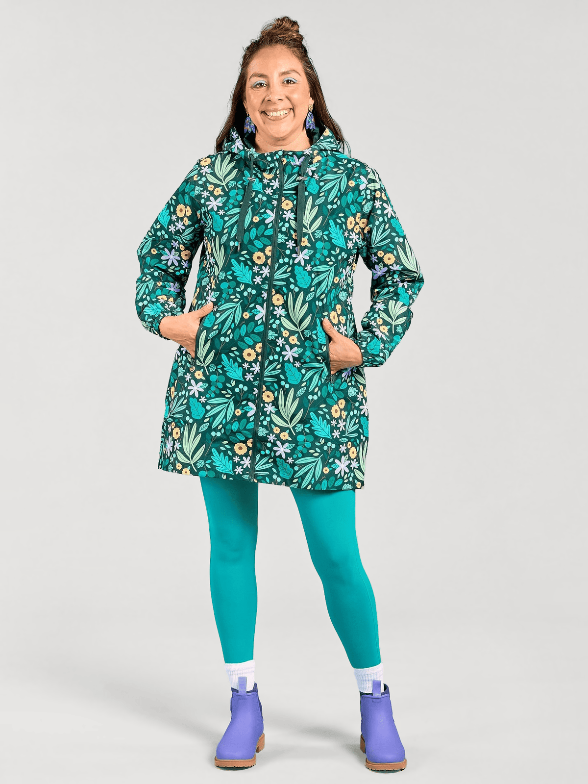 Leaves & Blooms Longline Raincoat - sustainable raincoats with adjustable hood, worn by Olga
