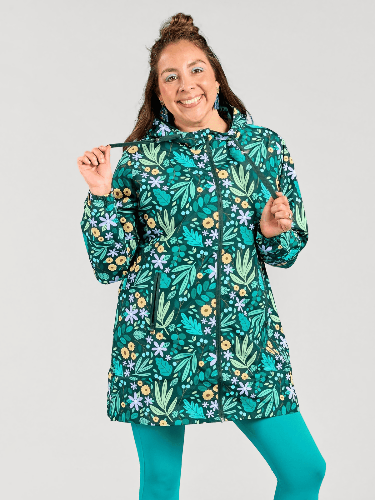 Leaves & Blooms Longline Raincoat - sustainable raincoats with adjustable hood, worn by Olga