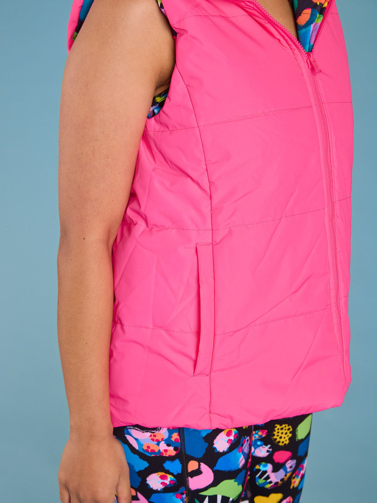 Patchwork Leopard Reversible Hooded Puffer Vest- Adults - Neon pink puffer vest with pockets