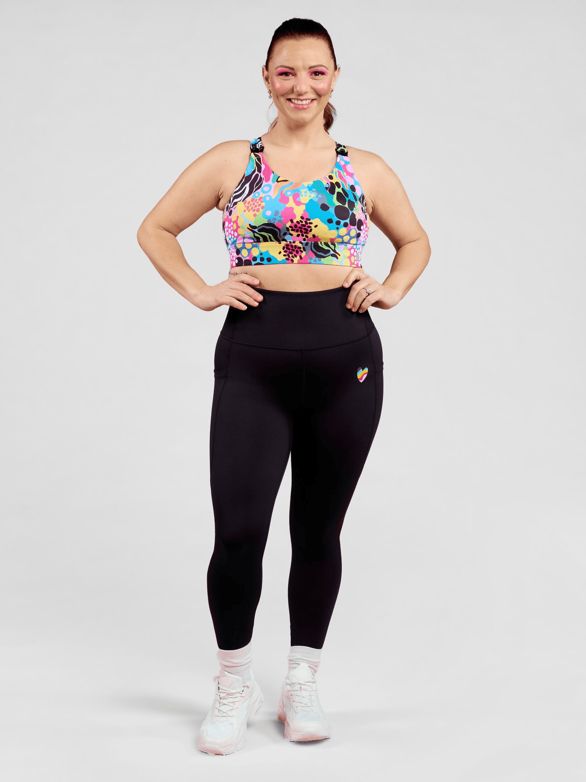 Rainbow at Heart Everyday Black Legging - 7/8 length - Everyday black leggings with pockets for gym and daily wear, worn by Jaime