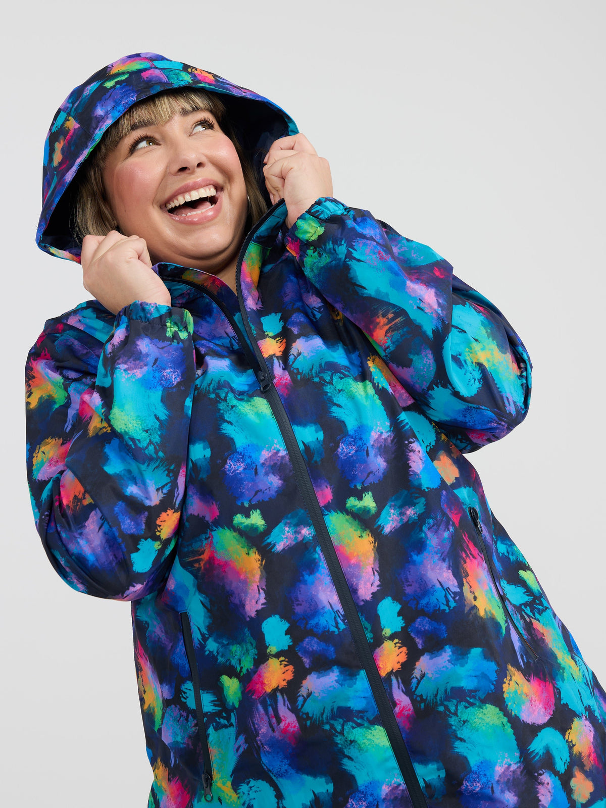 Rainbow Splatter Longline Raincoat - waterproof raincoat with adjustable hood