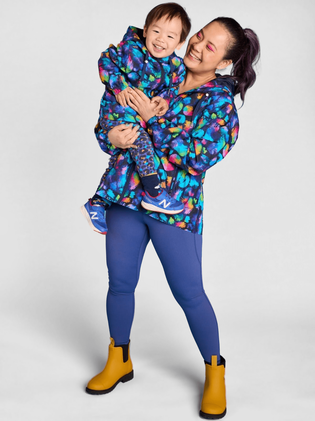 Rainbow Splatter Spray Jackets - Adults - matching mum and son clothes, worn by Faye