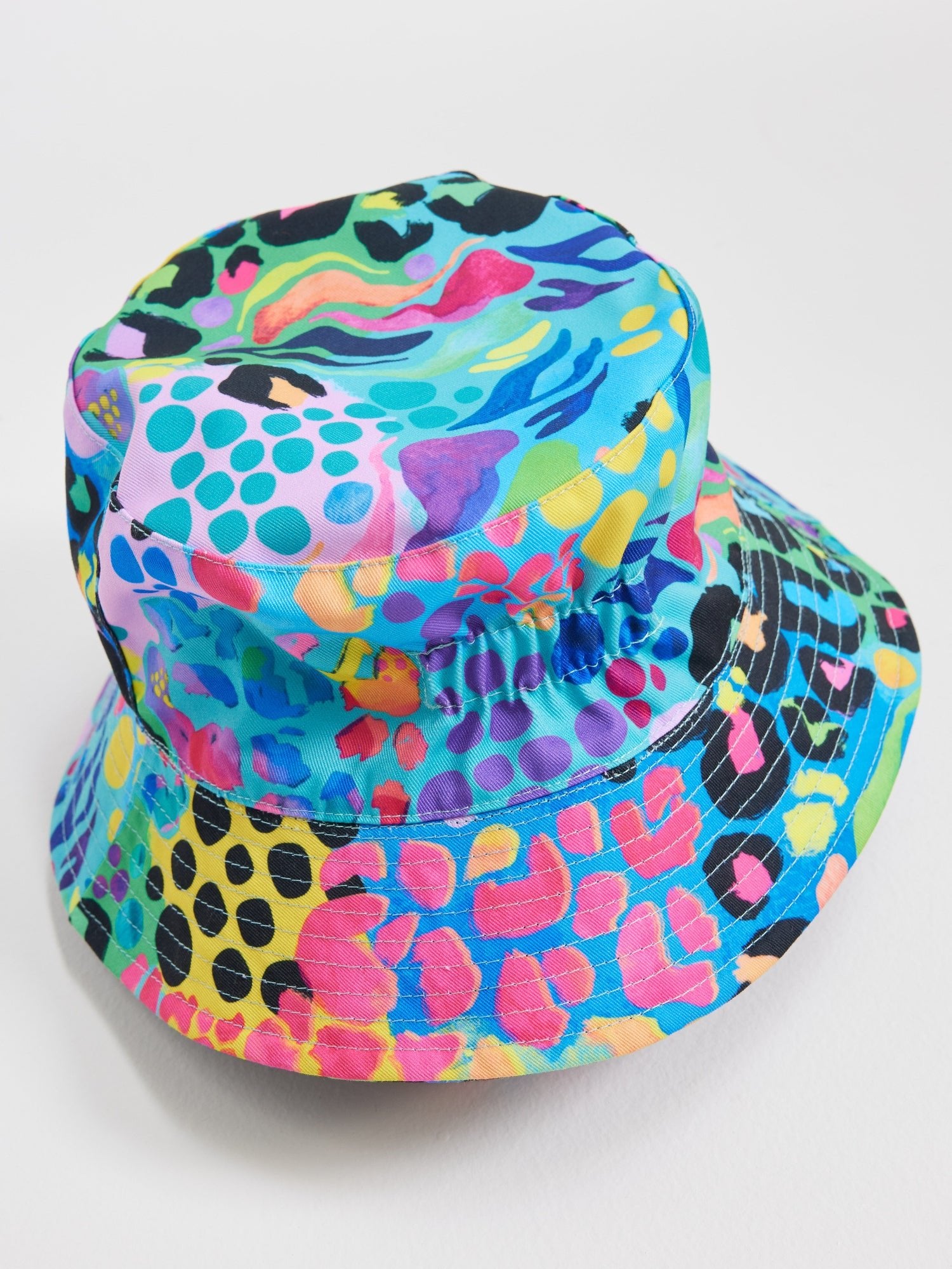 Reversible Bucket Hat - Reversible bucket hat Electric Leopard and Night Polka prints by Australian artist Kasey Rainbow