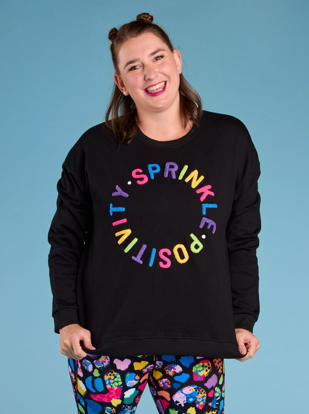 Sprinkle Positivity Organic Cotton Sweatshirt - Jet Black - Black oversized jumper with positive message